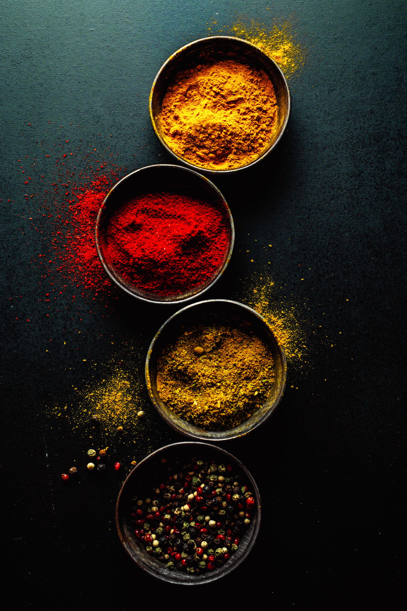 colorful spices dark table (1)